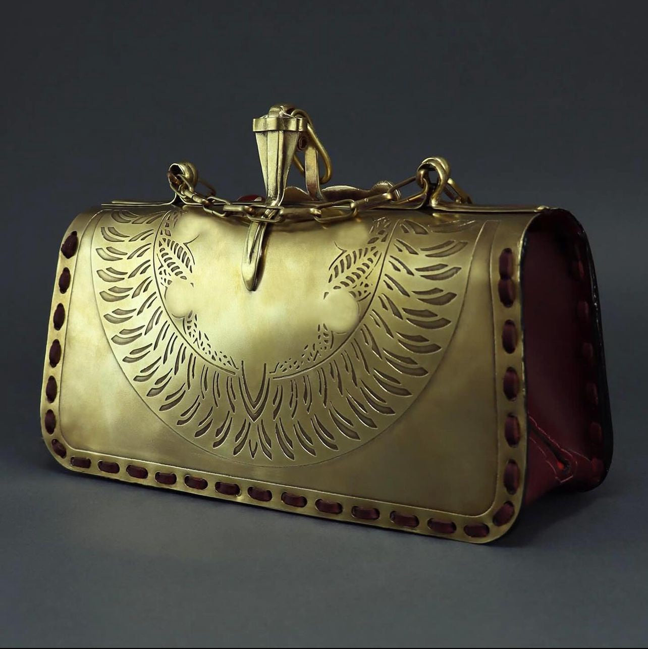 Sekhmet Brass and leather handbag