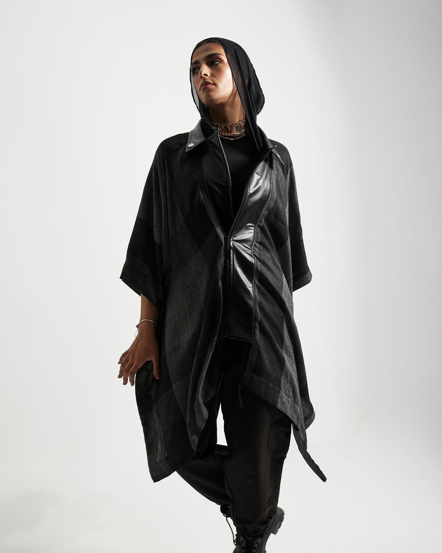 Cape with leather