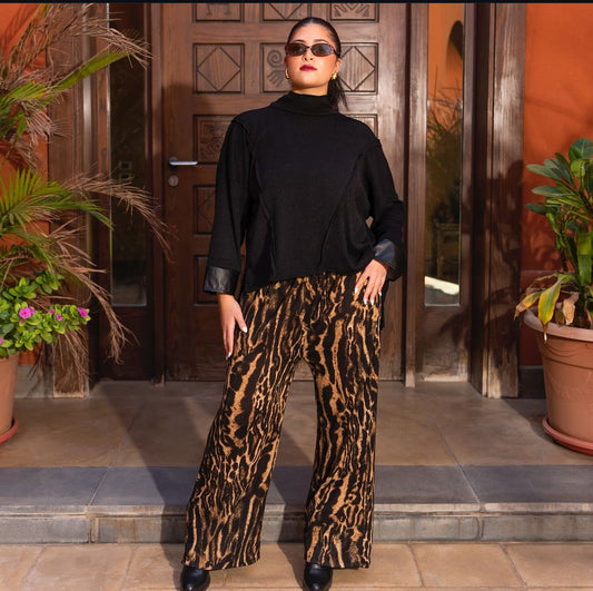 Black top & leopard pants